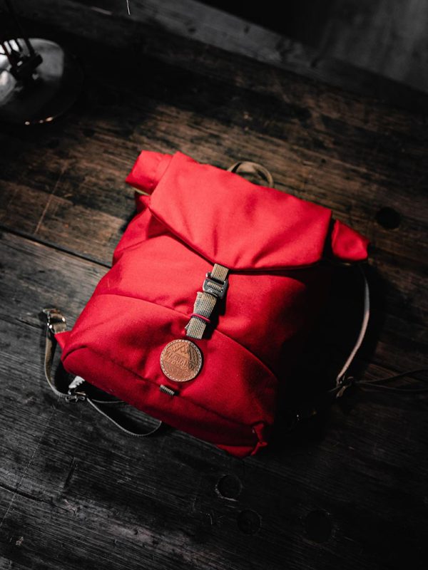 daniel-j-schwarz-JtPAZUXZzvk-unsplash Red Waterproof Travel Backpack
